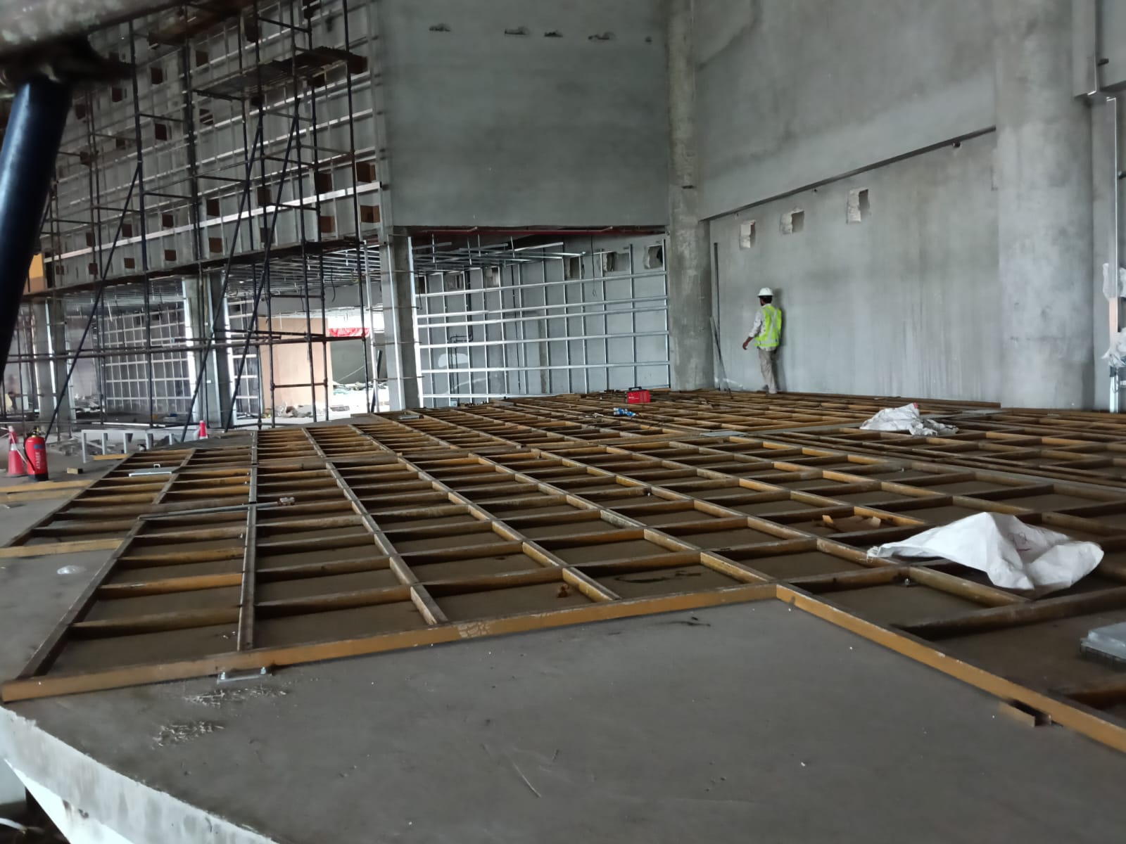 Large metal support grid under construction for a commercial stage